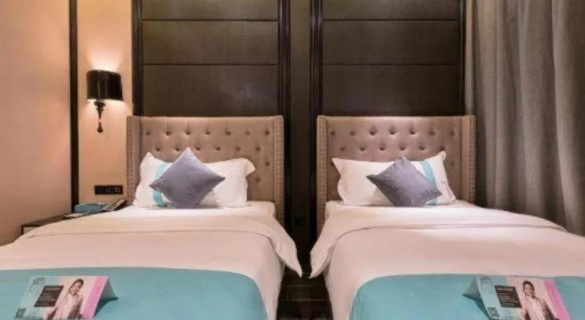 Bed in Xana Hotelle Beijing Fengtai Railway Station Tiantan Hospital