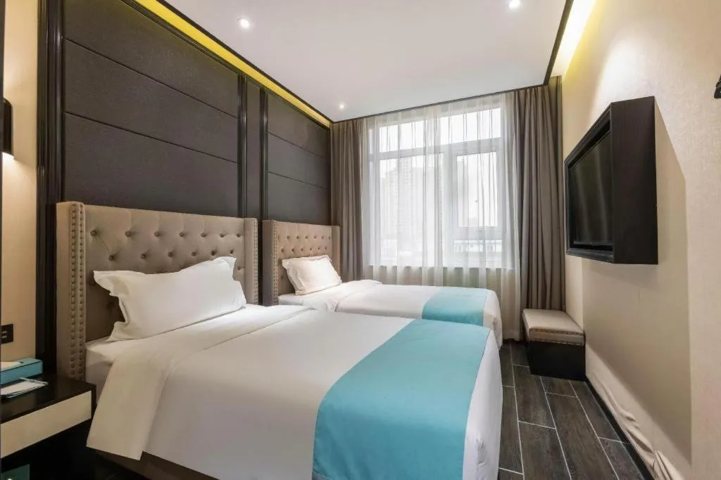 Bed in Xana Hotelle Beijing Fengtai Railway Station Tiantan Hospital