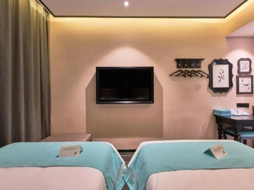 Bed in Xana Hotelle Beijing Fengtai Railway Station Tiantan Hospital