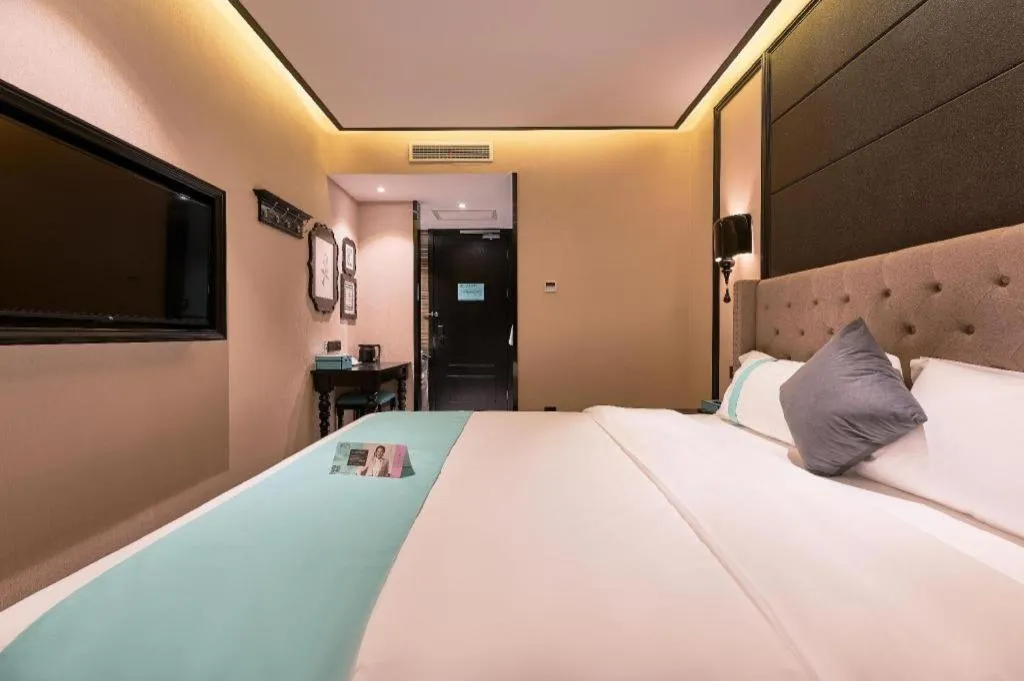 Bed in Xana Hotelle Beijing Fengtai Railway Station Tiantan Hospital