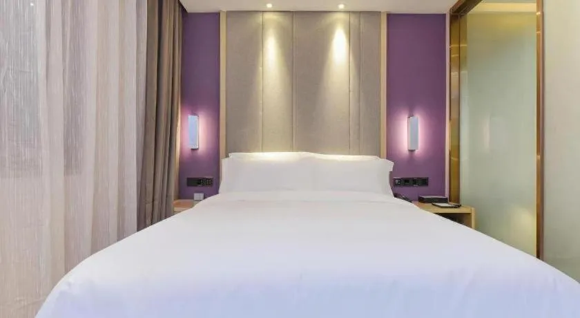 Bed in Lavande Hotel Chongqing Xinghui Liangjiang Happiness Plaza
