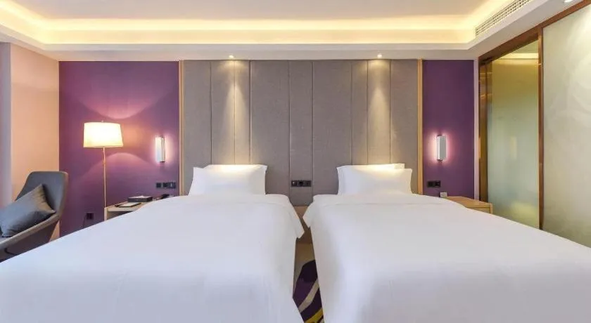 Bed in Lavande Hotel Chongqing Xinghui Liangjiang Happiness Plaza