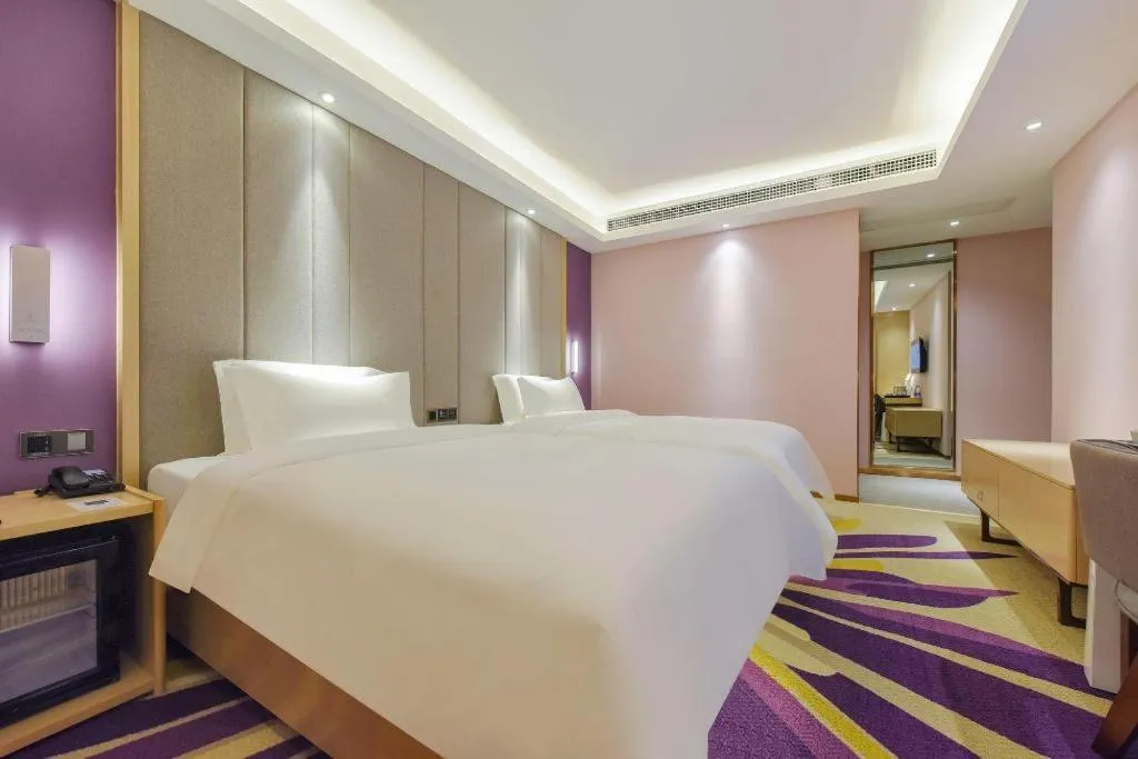 Bed in Lavande Hotel Chongqing Xinghui Liangjiang Happiness Plaza