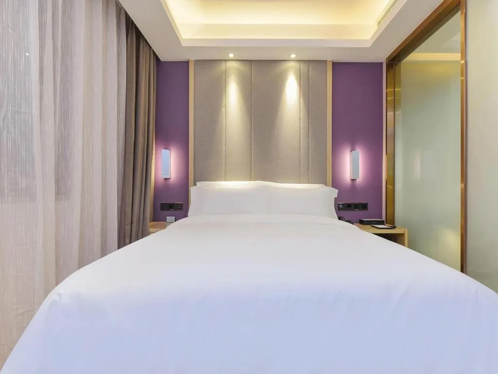 Bed in Lavande Hotel Chongqing Xinghui Liangjiang Happiness Plaza