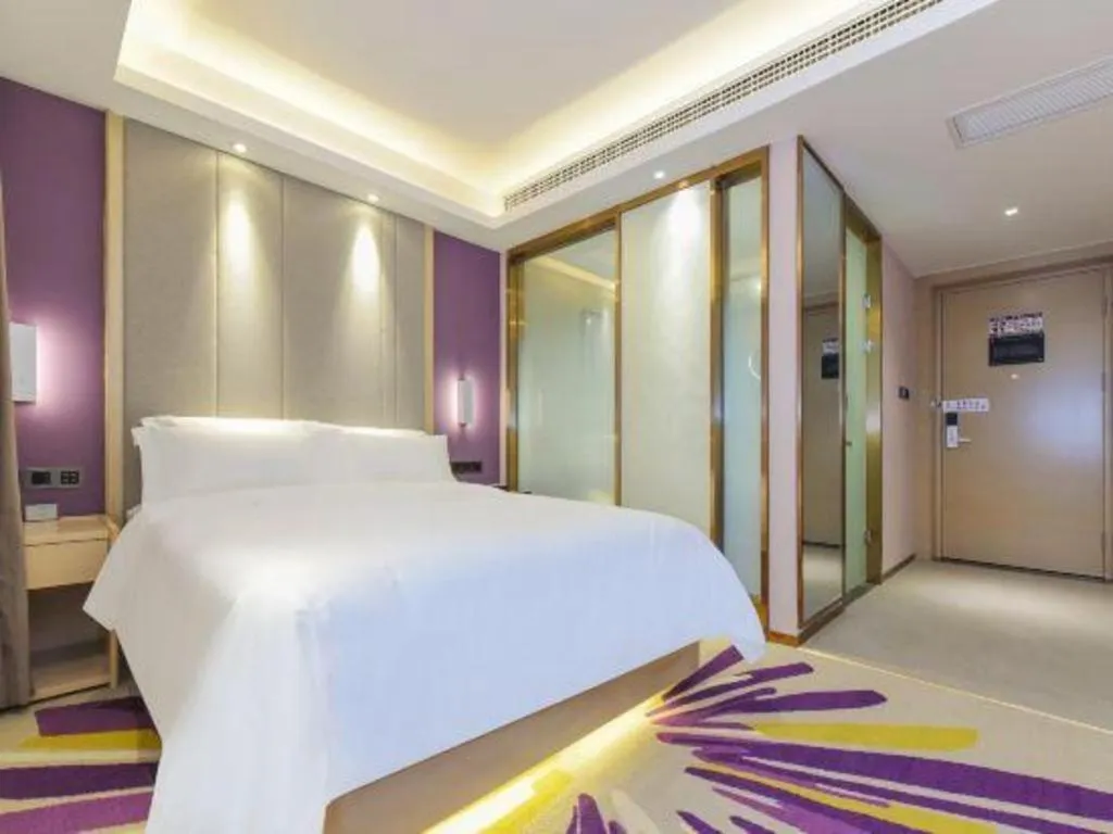 Bed in Lavande Hotel Chongqing Xinghui Liangjiang Happiness Plaza