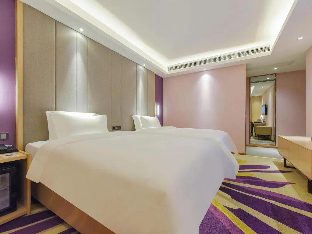 Bed in Lavande Hotel Chongqing Xinghui Liangjiang Happiness Plaza