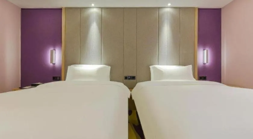 Bed in Lavande Hotel Chongqing Xinghui Liangjiang Happiness Plaza