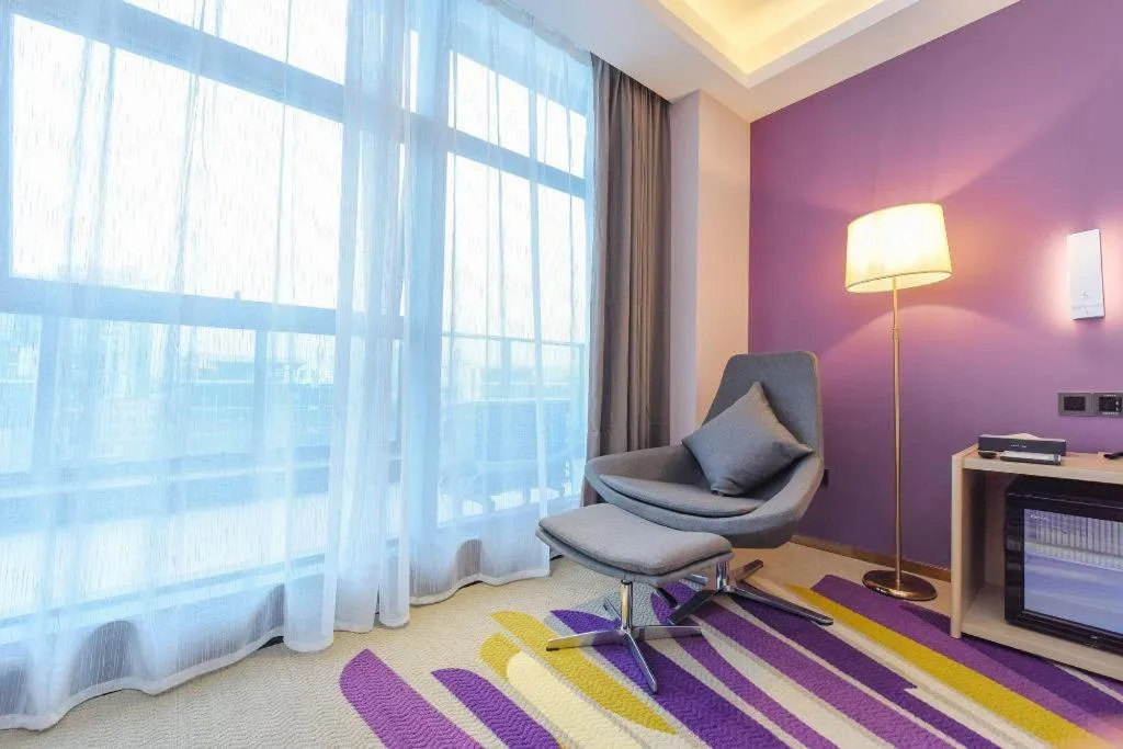 Bed in Lavande Hotel Chongqing Xinghui Liangjiang Happiness Plaza