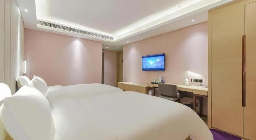 Bed in Lavande Hotel Chongqing Xinghui Liangjiang Happiness Plaza