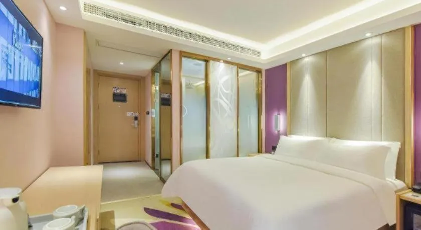 Bed in Lavande Hotel Chongqing Xinghui Liangjiang Happiness Plaza