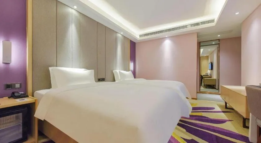 Bed in Lavande Hotel Chongqing Xinghui Liangjiang Happiness Plaza