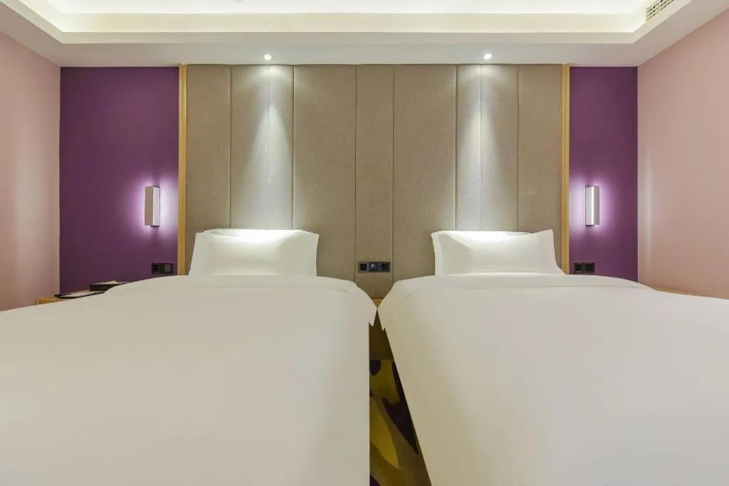 Bed in Lavande Hotel Chongqing Xinghui Liangjiang Happiness Plaza