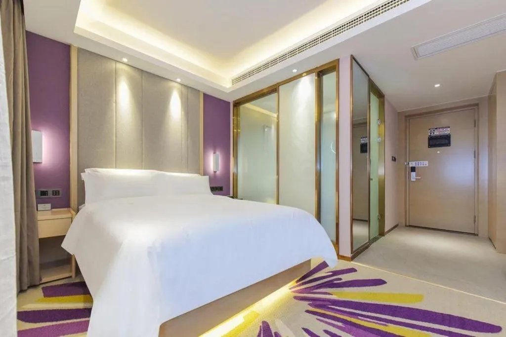 Bed in Lavande Hotel Chongqing Xinghui Liangjiang Happiness Plaza