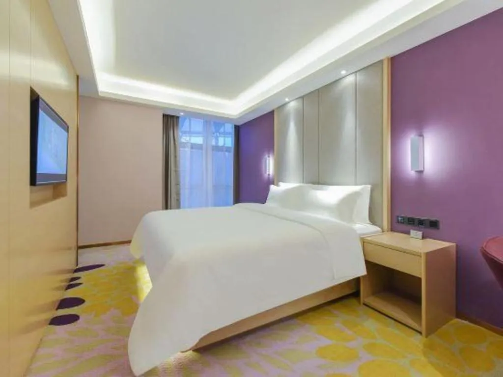 Bed in Lavande Hotel Chongqing Xinghui Liangjiang Happiness Plaza