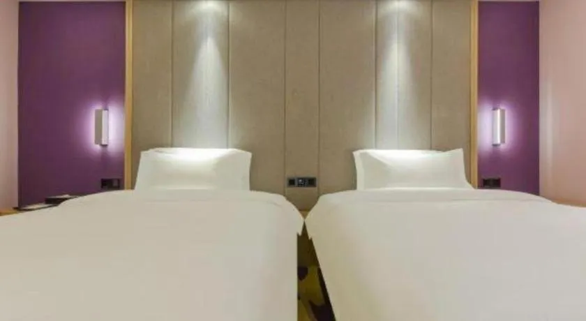Bed in Lavande Hotel Chongqing Xinghui Liangjiang Happiness Plaza