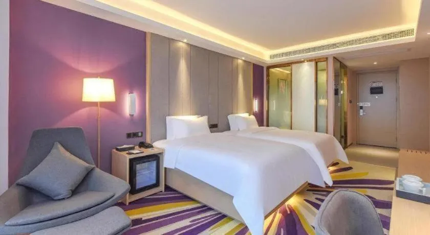 Bed in Lavande Hotel Chongqing Xinghui Liangjiang Happiness Plaza