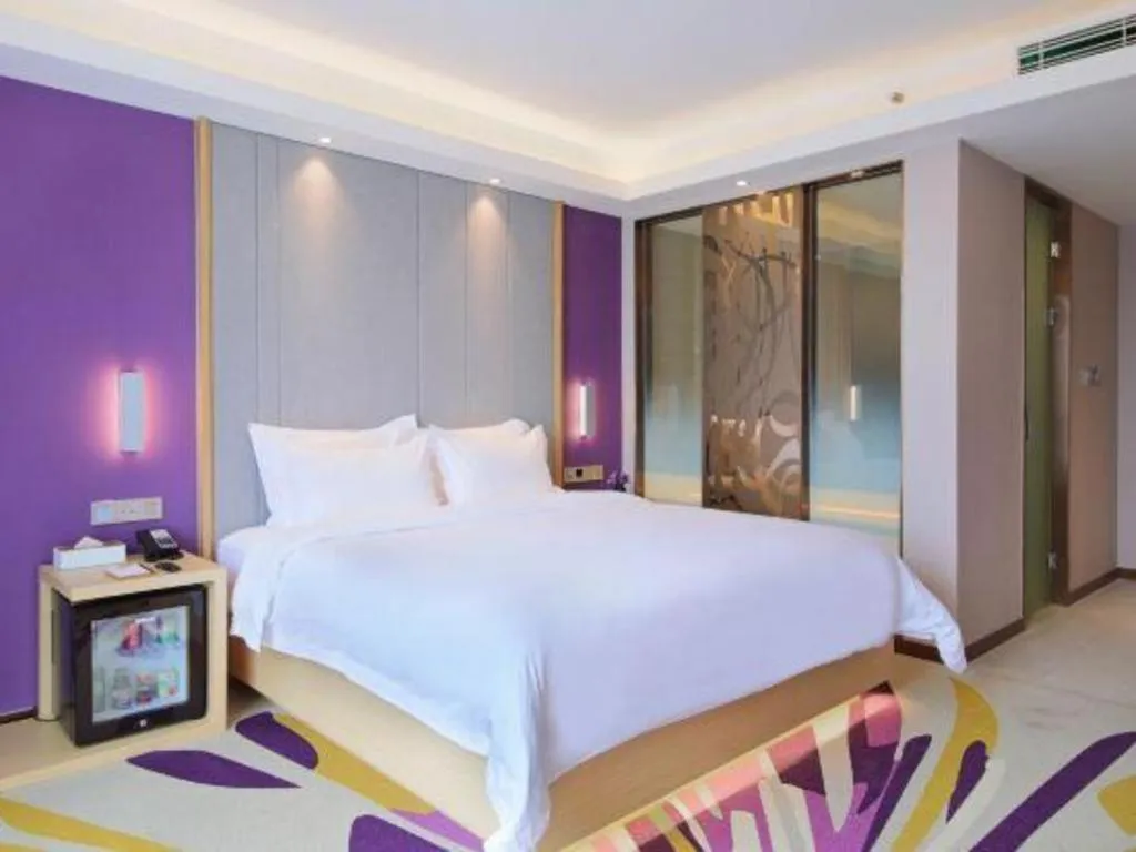 Bed in Lavande Hotel Chongqing Xinghui Liangjiang Happiness Plaza