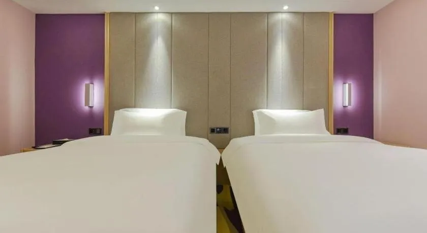 Bed in Lavande Hotel Chongqing Xinghui Liangjiang Happiness Plaza