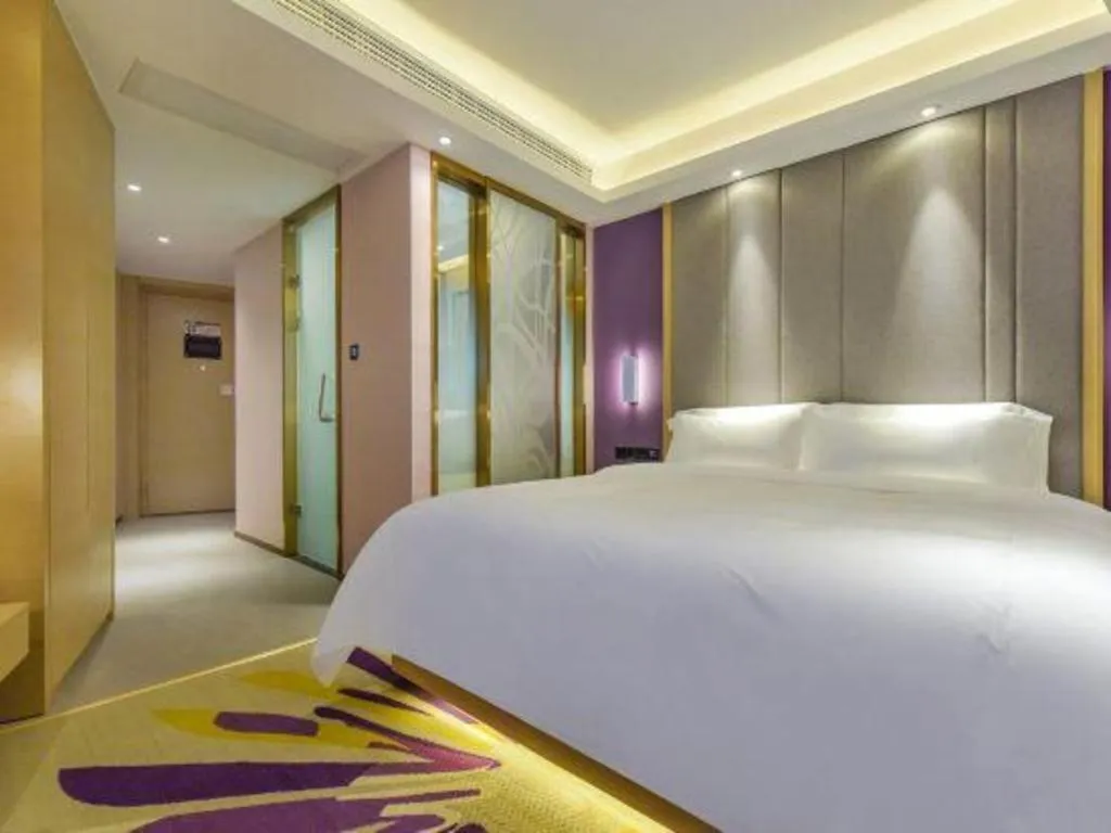 Bed in Lavande Hotel Chongqing Xinghui Liangjiang Happiness Plaza