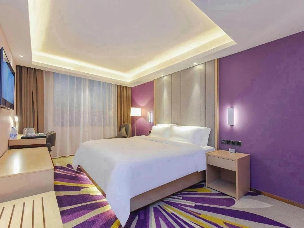 Bed in Lavande Hotel Chongqing Xinghui Liangjiang Happiness Plaza