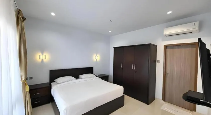 Bed in Toba Beach Hotel