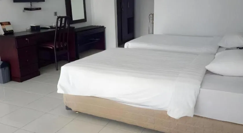 Bed in Toba Beach Hotel