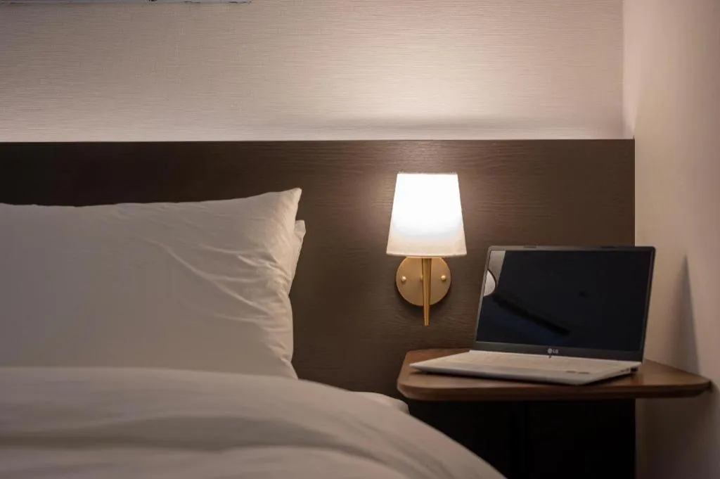 Bed in HOTEL D EDITION