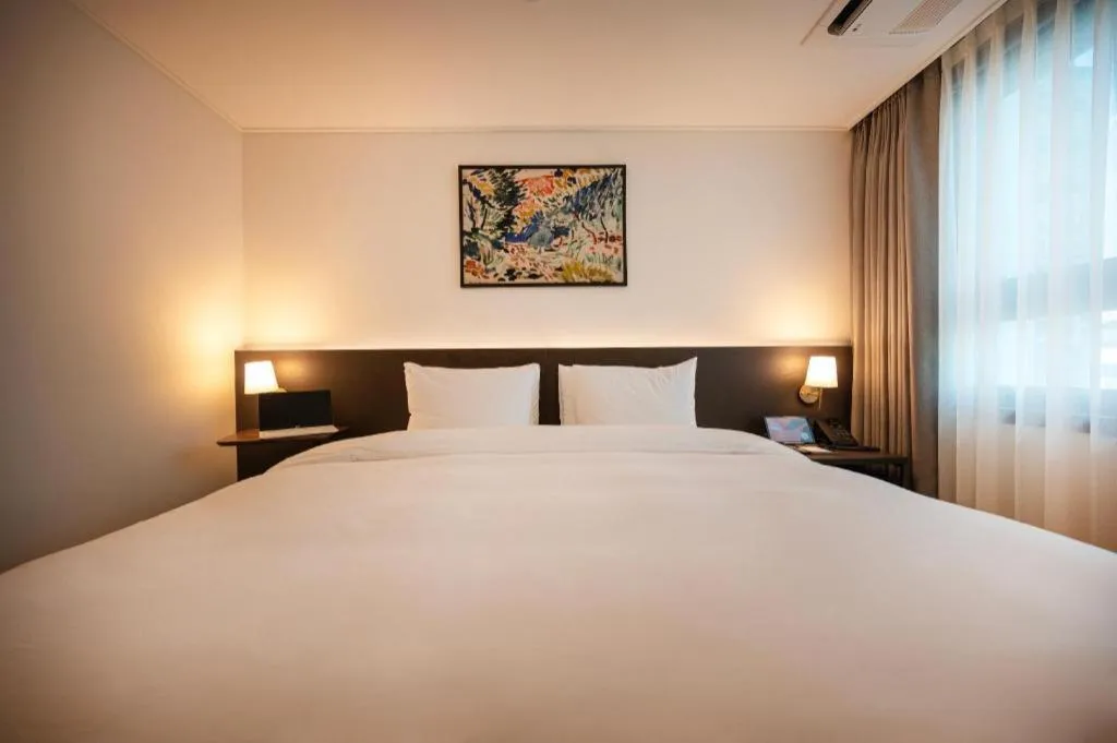 Bed in HOTEL D EDITION