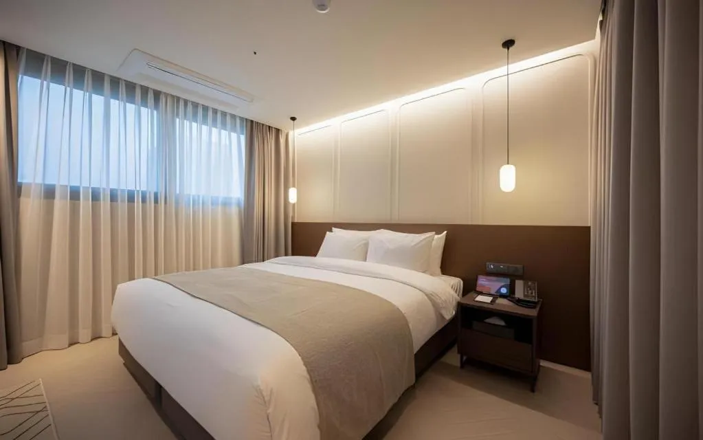 Bed in HOTEL D EDITION