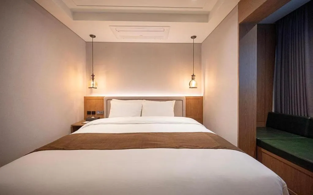 Bed in HOTEL D EDITION