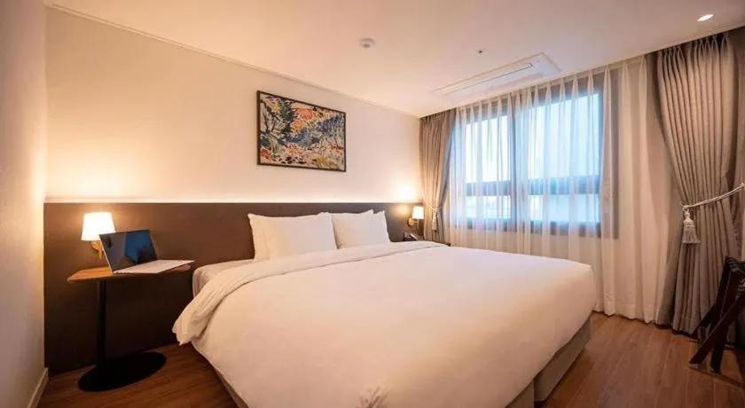 Bed in HOTEL D EDITION