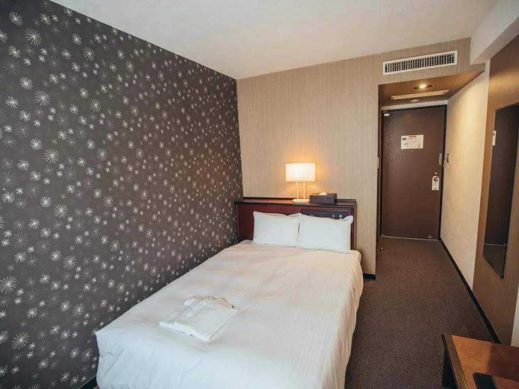 Bed in Hotel Areaone Miyazaki