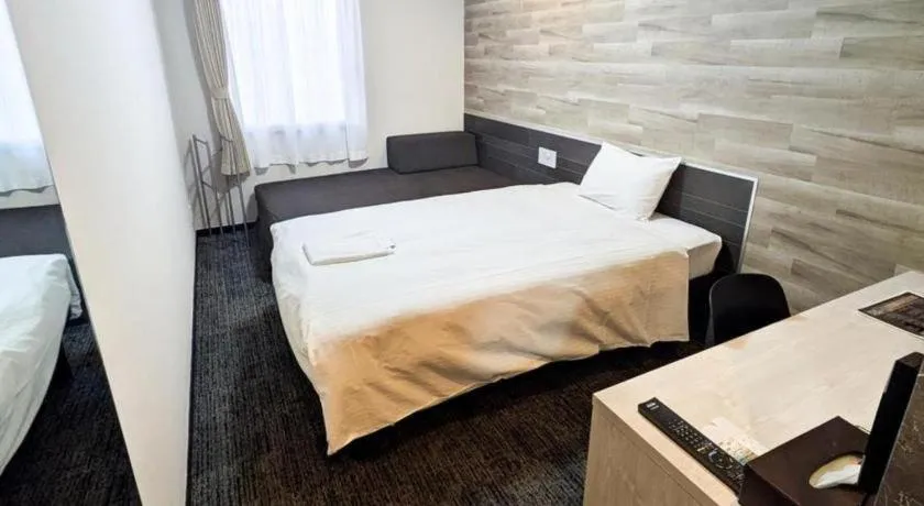 Bed in Hotel Areaone Miyazaki