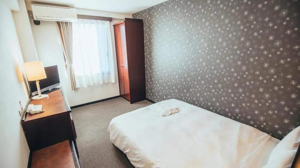 Bed in Hotel Areaone Miyazaki