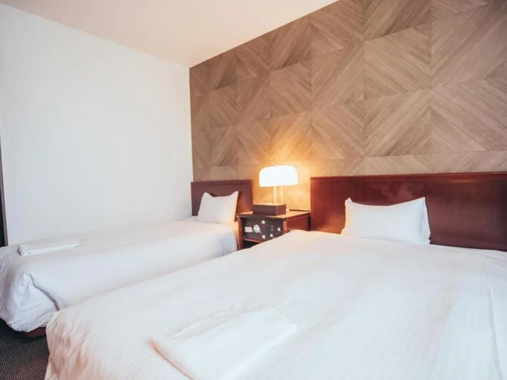 Bed in Hotel Areaone Miyazaki
