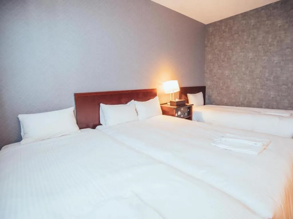 Bed in Hotel Areaone Miyazaki