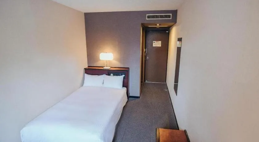 Bed in Hotel Areaone Miyazaki