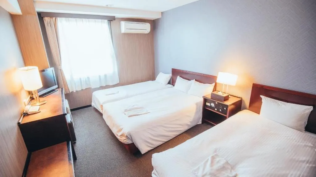 Bed in Hotel Areaone Miyazaki