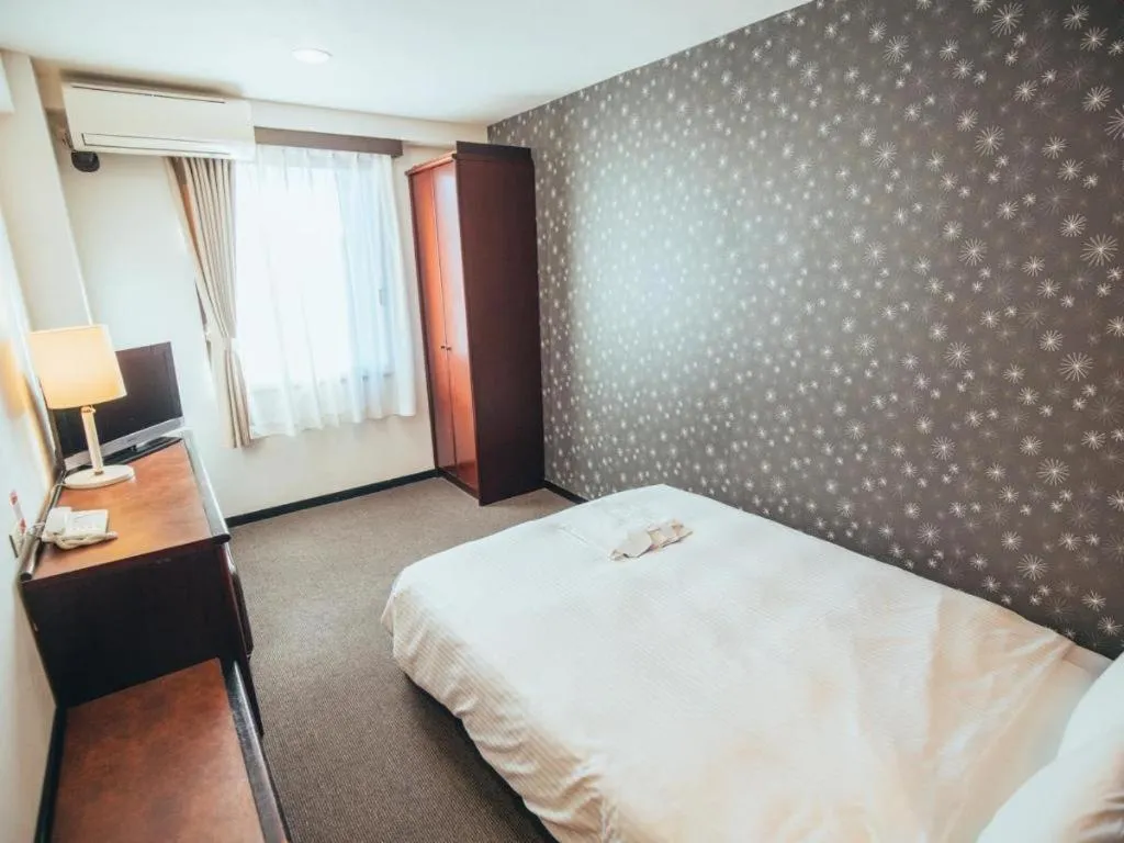 Bed in Hotel Areaone Miyazaki