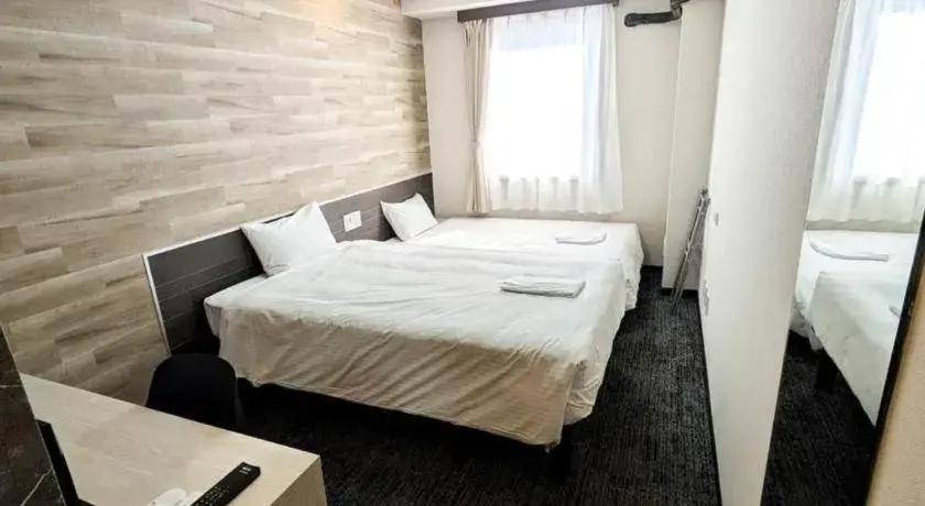 Bed in Hotel Areaone Miyazaki Bed in Hotel Areaone Miyazaki