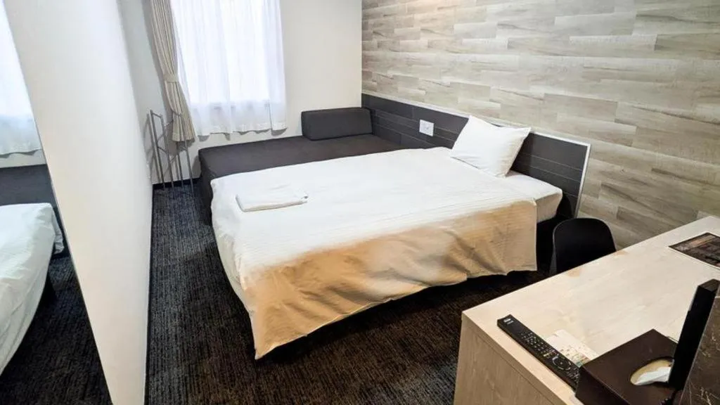 Bed in Hotel Areaone Miyazaki