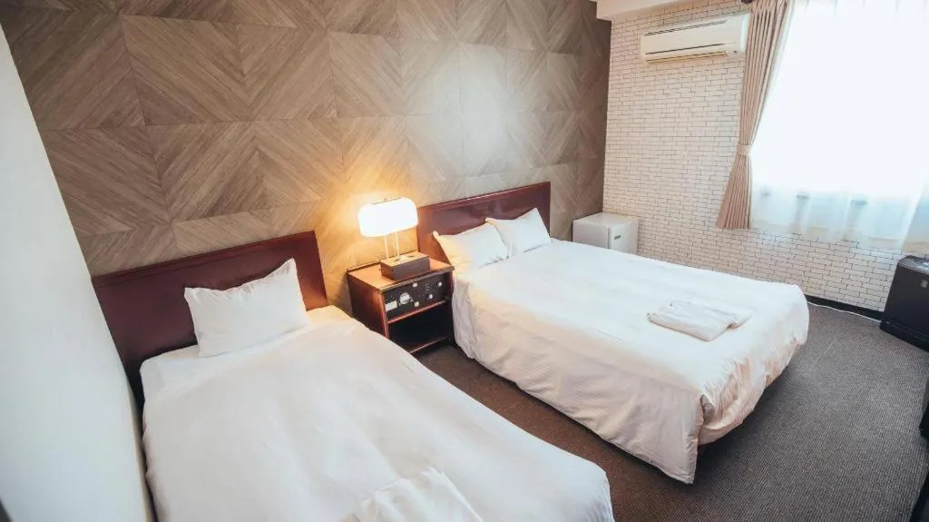 Bed in Hotel Areaone Miyazaki