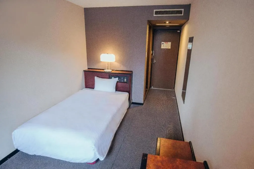 Bed in Hotel Areaone Miyazaki