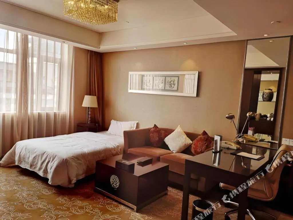 Bed in Xian Grand Soluxe International Hotel