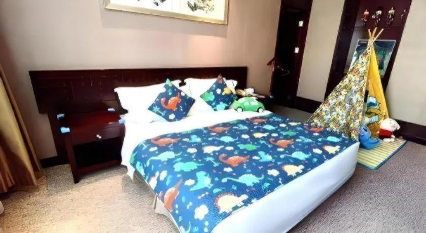 Bed in Xian Grand Soluxe International Hotel