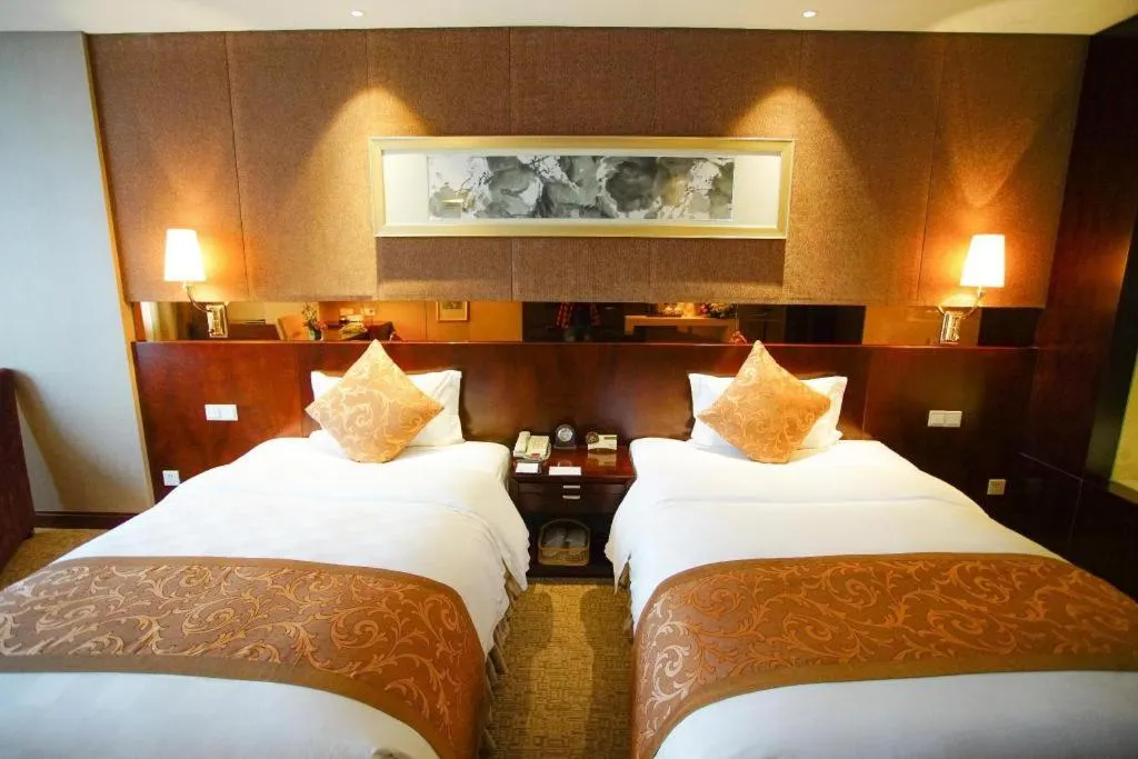 Bed in Xian Grand Soluxe International Hotel