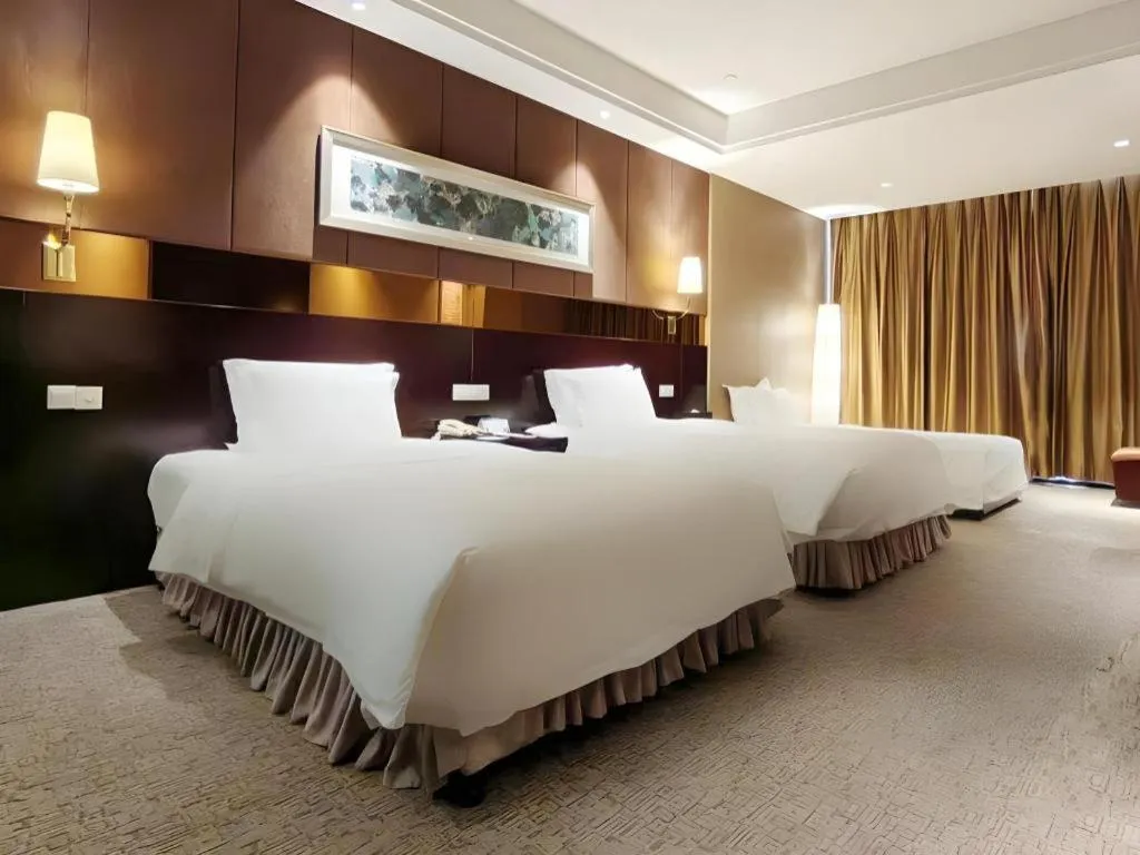 Bed in Xian Grand Soluxe International Hotel