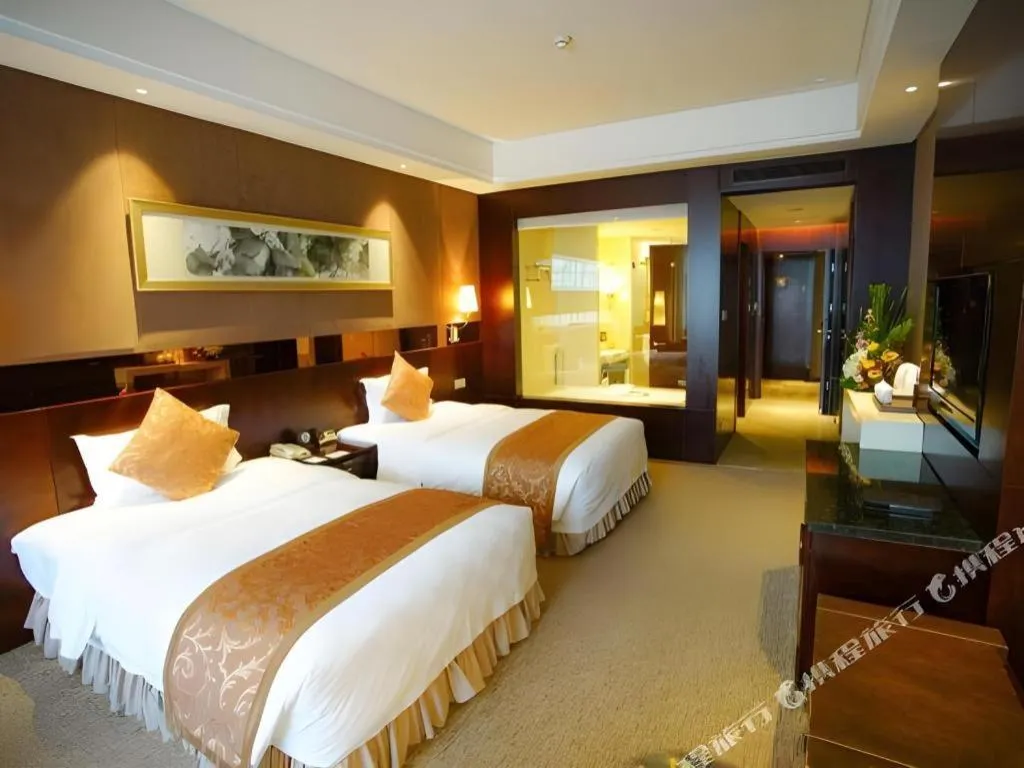 Bed in Xian Grand Soluxe International Hotel