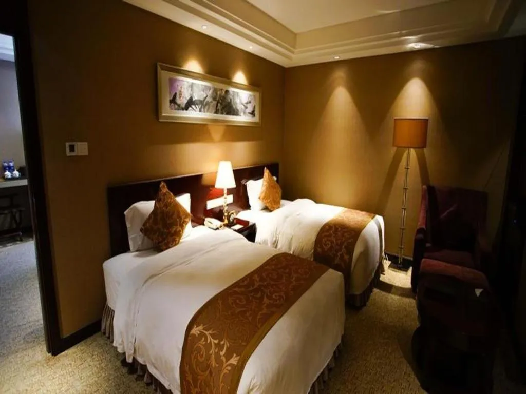 Bed in Xian Grand Soluxe International Hotel