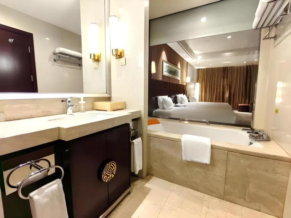 Bed in Xian Grand Soluxe International Hotel